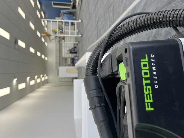Caremore Pharmacy — During · retail floor construction