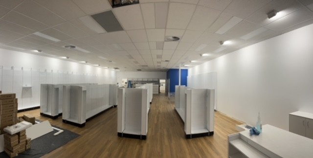 Caremore Pharmacy — During · merchandising fixtures