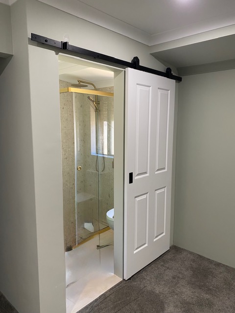 Residential Ensuite — After · sliding barn door