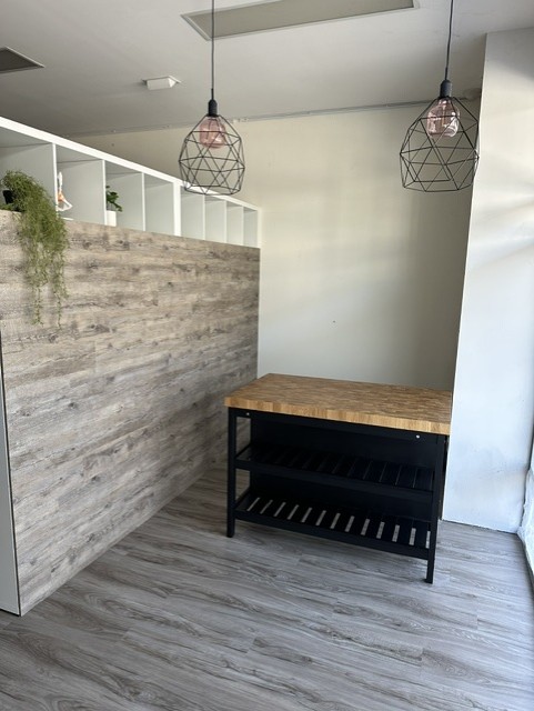 Physio Inq Baldivis — Reception-side joinery and feature lighting