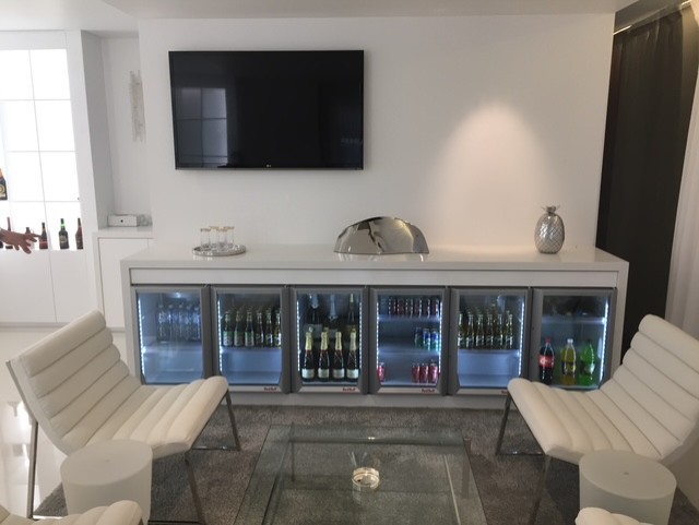 Last Detail Design — After · showroom bar and client area