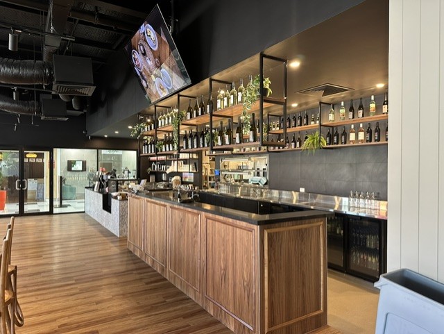 Stella Rossa — After · bar and display shelving