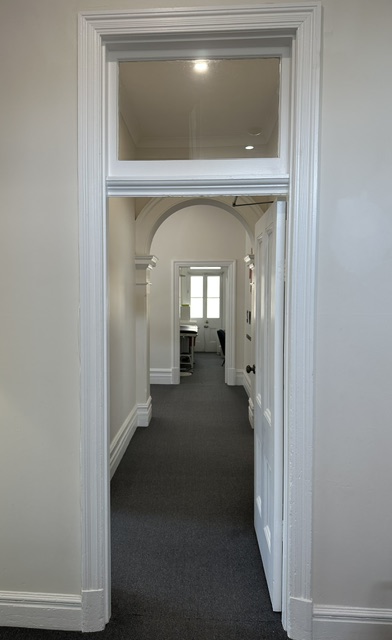 Swiss Family Clinic — Restored arches and internal detailing